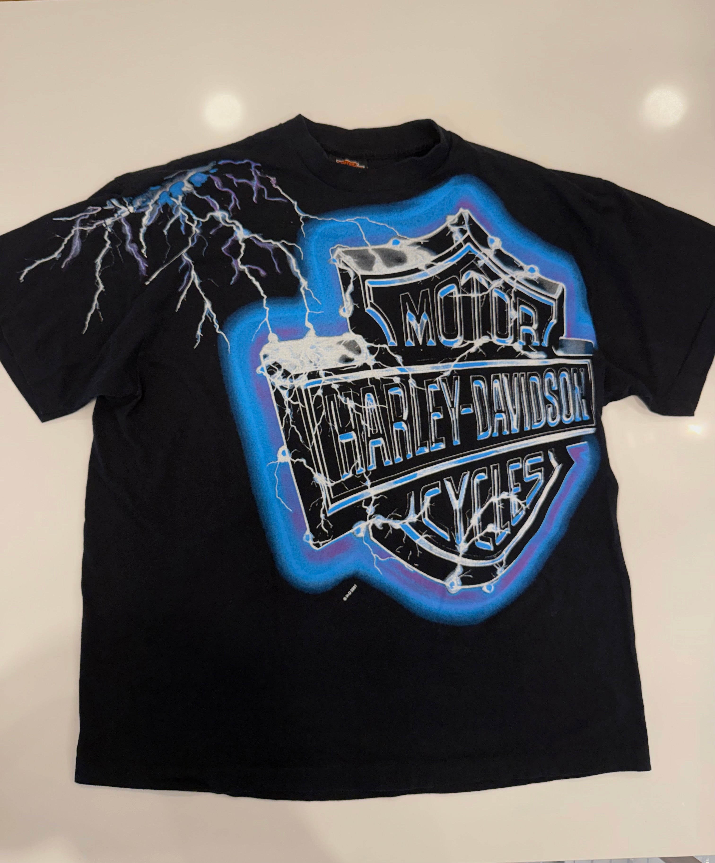 Striking bright blue lighting T shirt