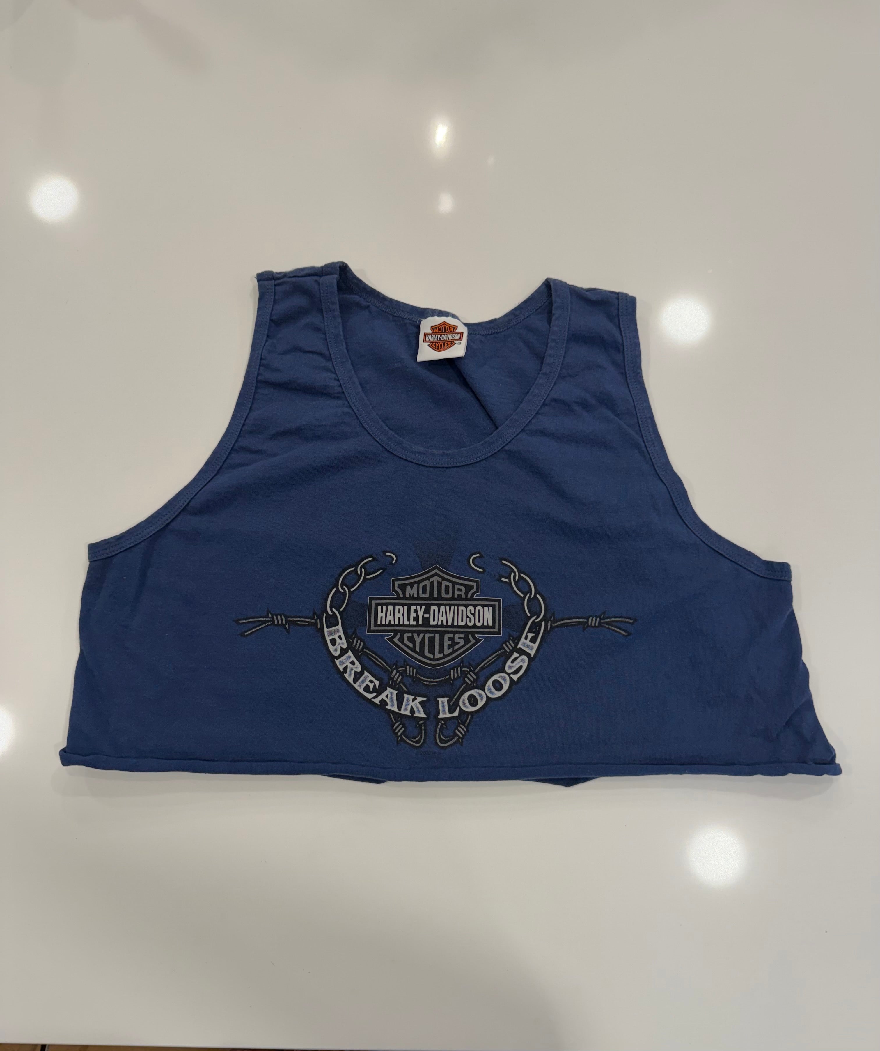 Break loose barb wire cropped tank